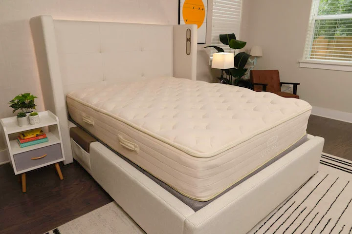 The Bear Natural mattress on top of a bed frame