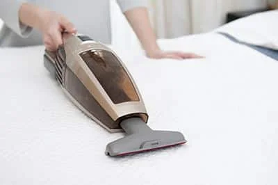 mattress buying guide xieyuliang vacuuming