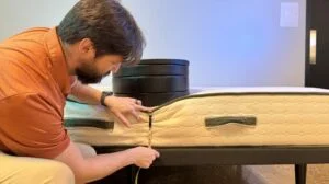 Measuring weight plates on the edge of the Avocado Green Mattress