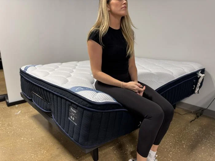 Seated edge support test on the DreamCloud Premier Hybrid Mattress