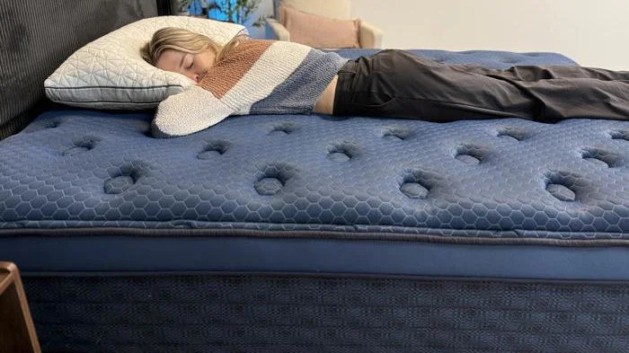 Our tester stomach sleeping on the Brooklyn Bedding Signature Hybrid Mattress