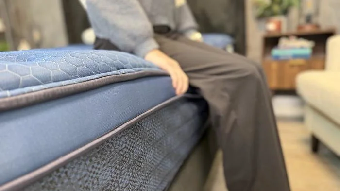 Seated edge support test on the Brooklyn Bedding Signature Hybrid Mattress