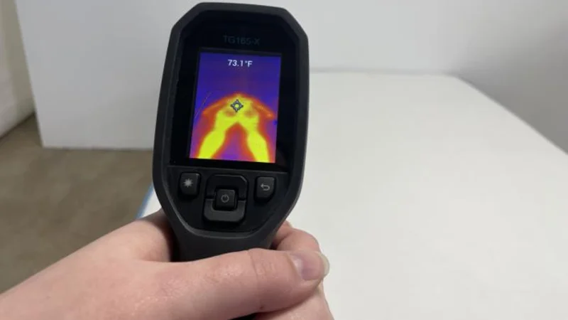 Our tester taking thermal readings