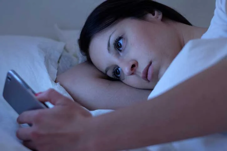 Australian Survey Finds Higher Rates Of Sleep Loss From Mobile Phone Use australian phone sleep woman