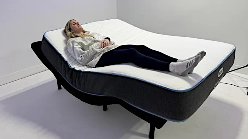 Our tester using a Bear Original Mattress on an adjustable bed