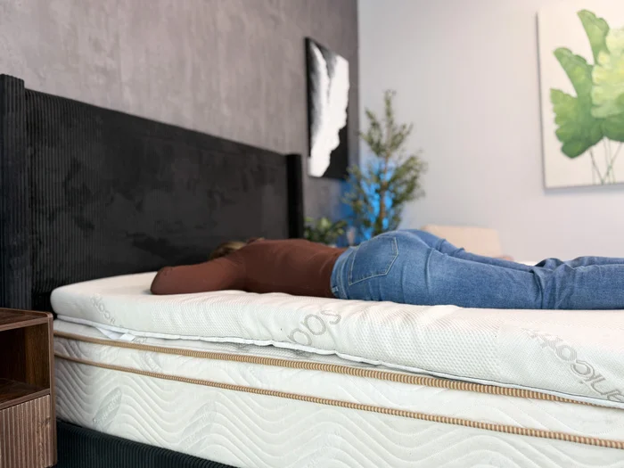 Stomach sleeping on the Saatva Graphite Memory Foam topper