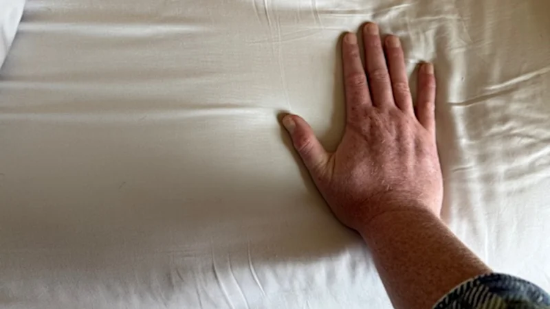 Our tester feeling a LUXOME Luxury Sheet Set