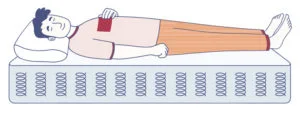 What Is An Orthopedic Mattress? (And Is It Right For You?) Man Sleeping On An Innerspring Mattress