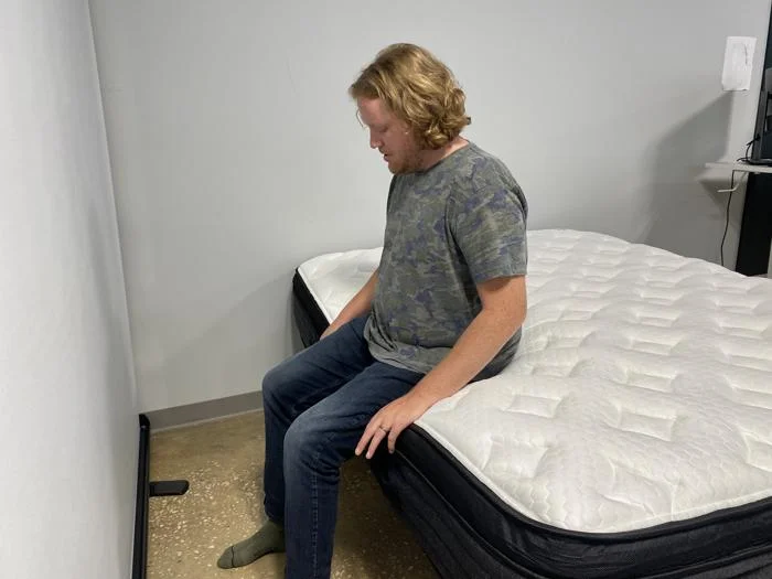 Seated edge support test on the Nolah Evolution Comfort Plus Mattress