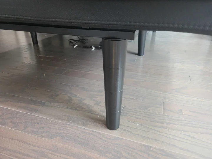 A close-up of the leg of the Sealy Ease base