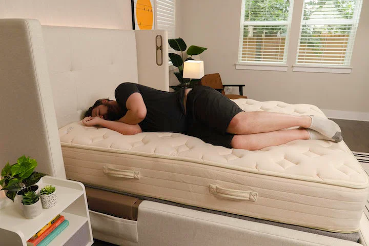 a man sleeps on his side on the Bear Natural