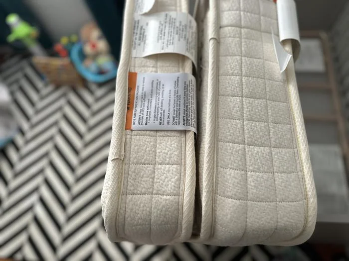 Comparing the thicknesses of the Avocado Eco and Luxury Crib Mattresses