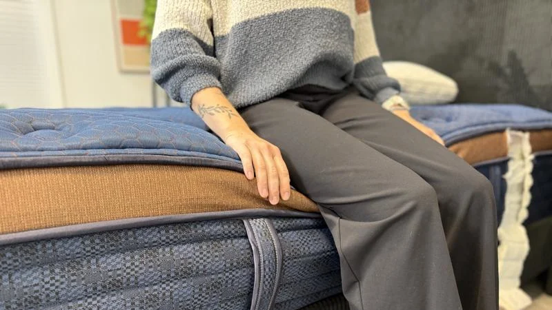Seated edge support test on the Brooklyn Bedding Aurora Luxe Mattress