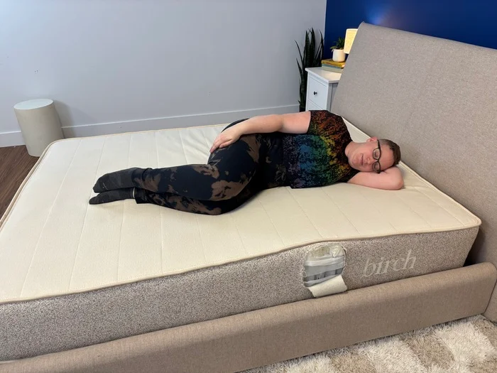 tester side sleeping on the birch natural mattress