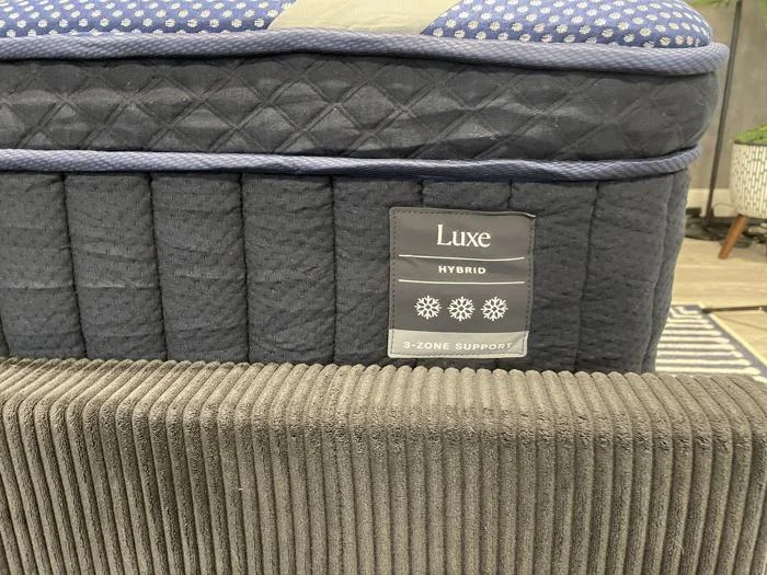 A close look at the tag on a DreamCloud Luxe Hybrid
