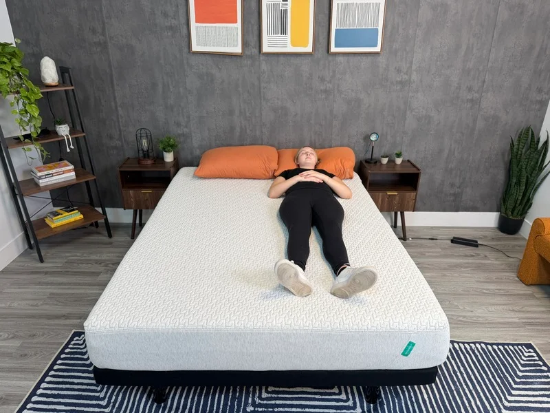 A blonde woman back sleeping on the Tuft & Needle Original mattress