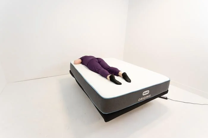 Stomach-sleeping full body edge support test on the Bear Original Mattress