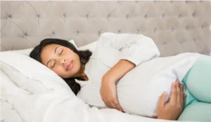 sleeping pregnant woman sleeping pregnant woman