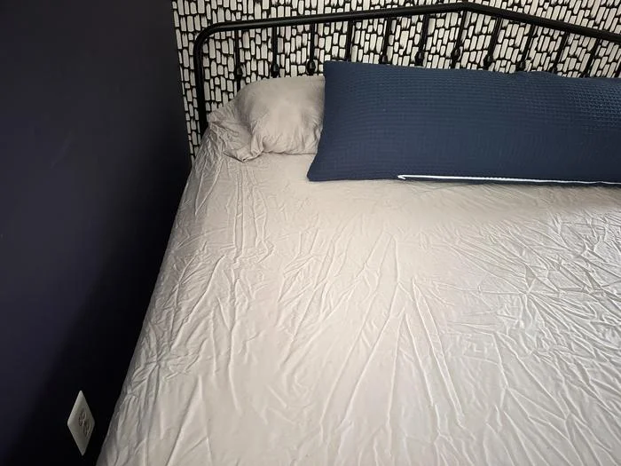 Quince Bamboo Bed Sheets on a bed