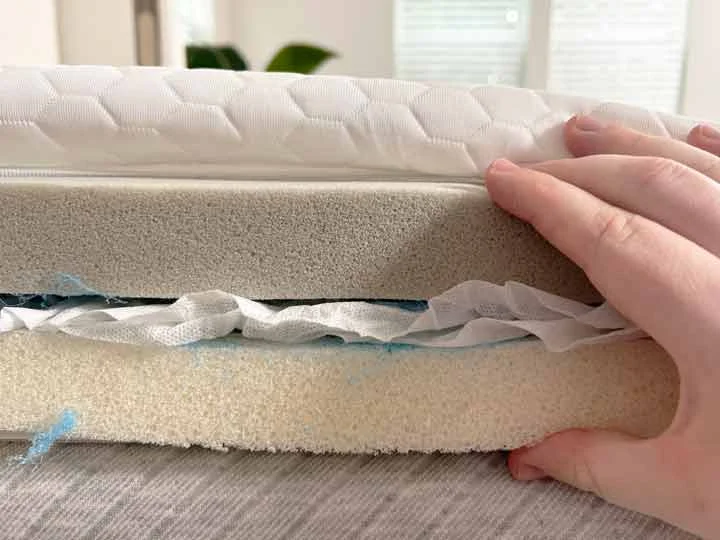 A close up image showing the three main layers to the Helix GlacioTex mattress topper