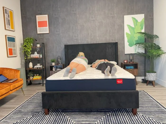 Testers lay on the bed testing motion isolation