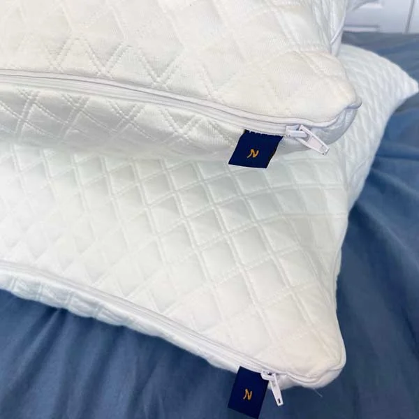 Nolah Squishy pillows Two Nolah Squishy pillows sit on a bed