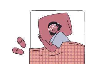 woman sleeping on side in a sleep mask