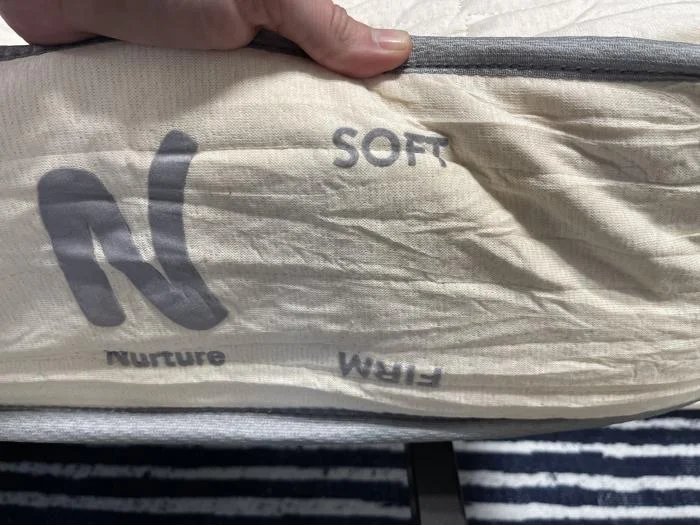 Soft and firm side of an inflating Nolah Nurture Kids Mattress