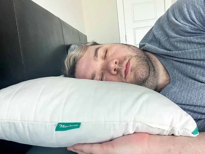 An image of a man sleeping on his side using the Marlow Pillow. An image of a man sleeping on his side using the Marlow Pillow.