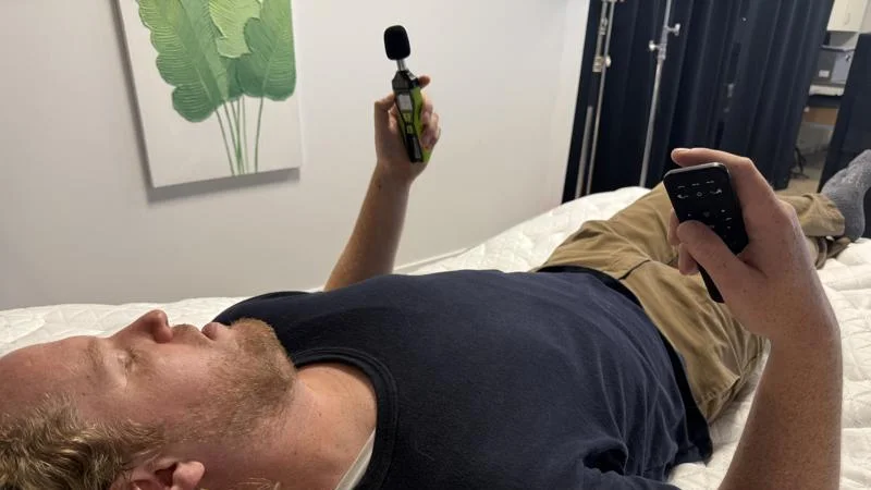 Our tester takes a decibal reading of the Helix Adjustable Base