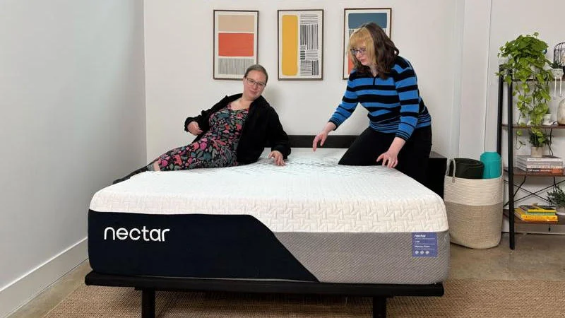 Mel and Livvi pose for photos with the Nectar Luxe Memory Foam Mattress