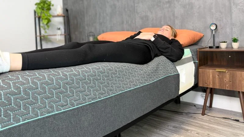 Full body edge support test of the Tuft & Needle Mint Hybrid Mattress