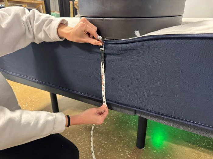 Weights are added to the Big Fig Classic mattress to measure edge support