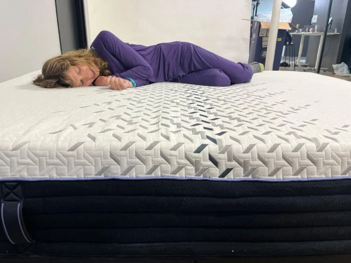 Our tester side sleeping on the Nectar Luxe Hybrid