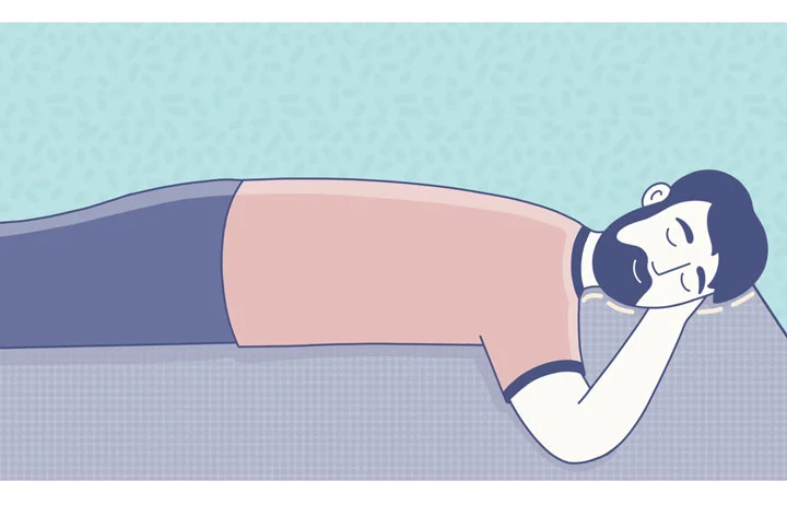 Pillow Size Guide A man rests on a pillow