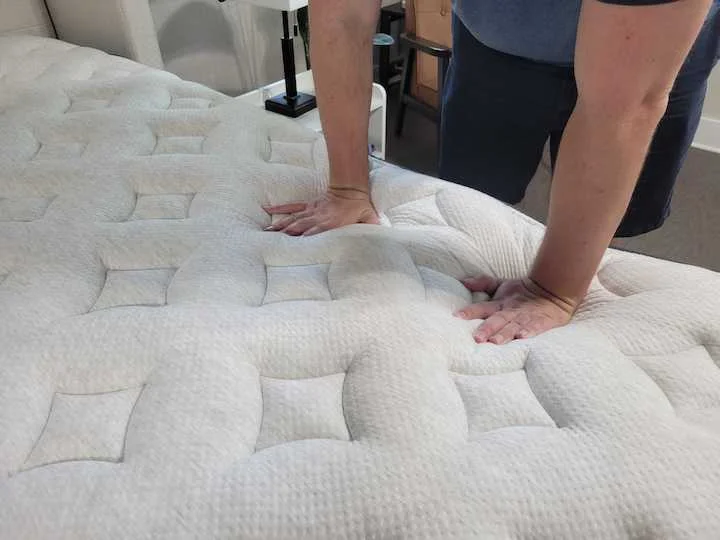 a man tests the Helix Plus Luxe's responsiveness