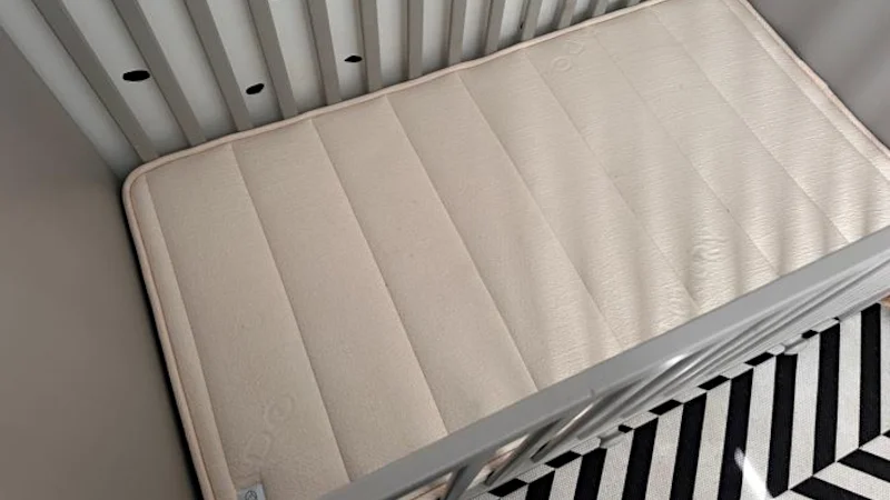 avocado eco organic crib mattress inside a crib