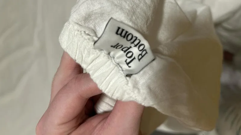 Tag on Coop Sleep Goods Cotton Linen Sheets