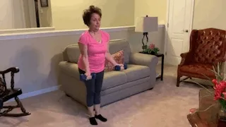 Woman doing dumbbell bicep curls