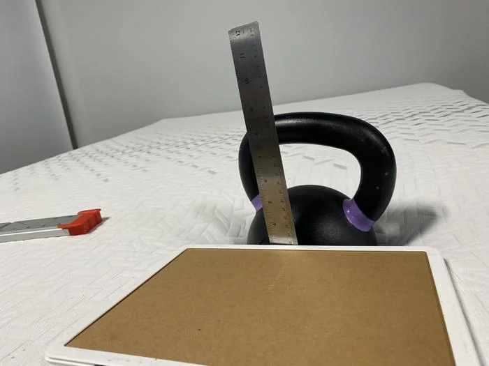 Sinkage test on the Nectar Premier Memory Foam