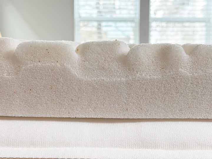 A close up image showing how thick the MOLECULE CopperWELL topper is.