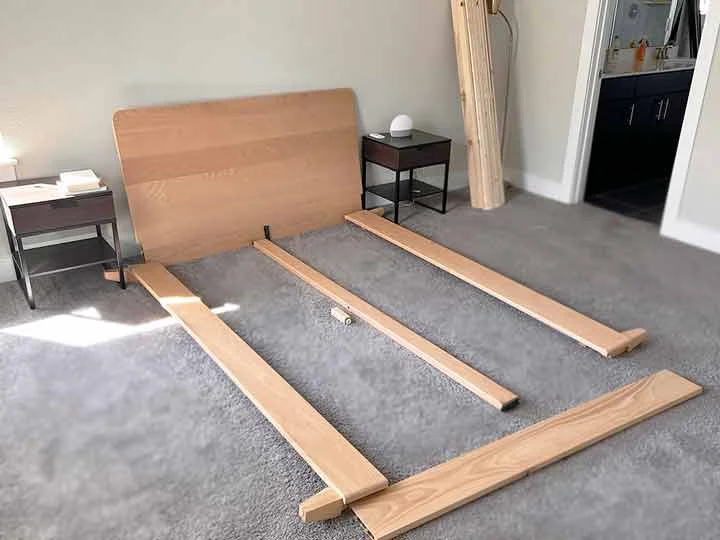 An image of the pieces that make up the Avocado City Bed Frame