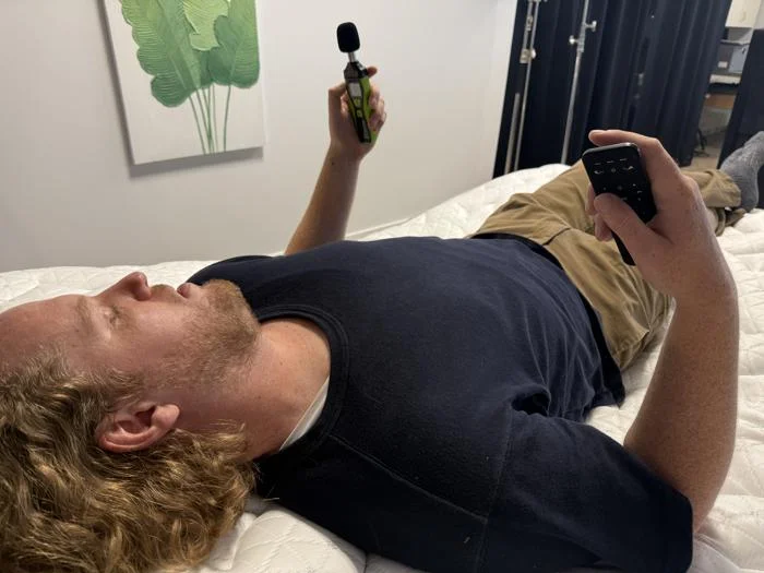 Our tester takes decibal readings while operating the Helix Adjustable Base