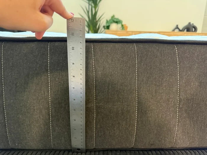 Measuring the height of the Titan Plus Core mattress