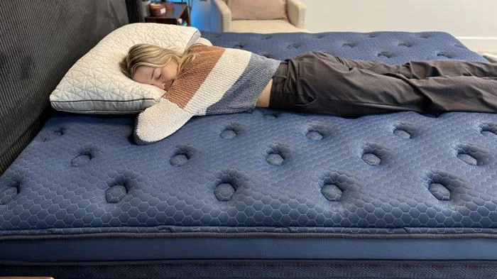 Our tester stomach sleeping on the Brooklyn Bedding Signature Hybrid Mattress