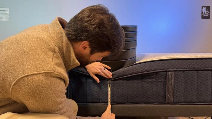 Measuring the deflection from weight plates on the edge of the Aurora Luxe Cooling Mattress